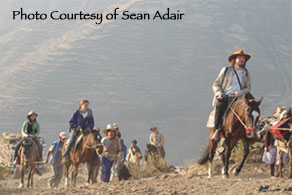 Image of Robert Schoch leading (on horseback) a group to the top 
					of the Markawasi Platuea. Photo: Sean Adair
