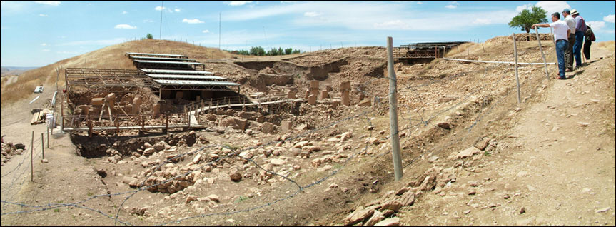 Composite image of Göbekli Tepe (from the southeast looking northwest); 
					photos taken in 2010, before this area of the site was covered with a modern 
					roof